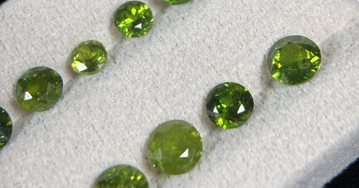 Demantoid Garnet The Jewel of Russian Mines with a Horsetail Inclusion
